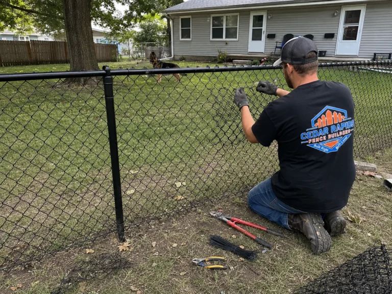 Robins, Iowa fence project showing black chain link fence repair