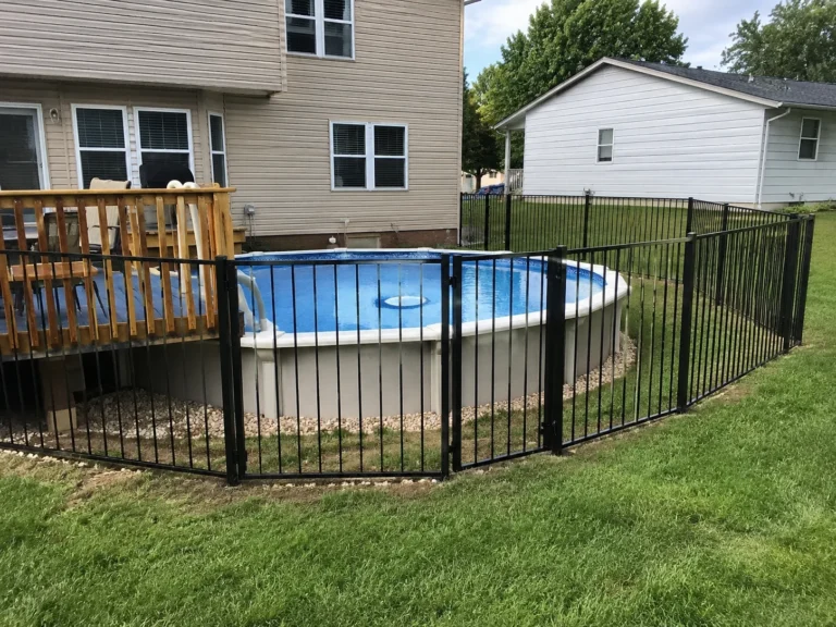 black ornamental pool fence around an above ground pool in Cedar Rapids, Iowa