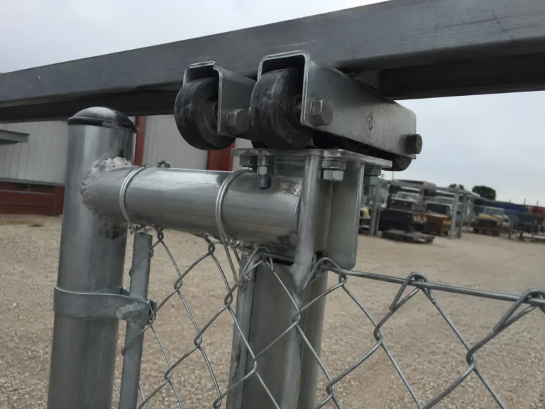 Close view of chain link gate roller and latch hardware in Cedar Rapids, Iowa