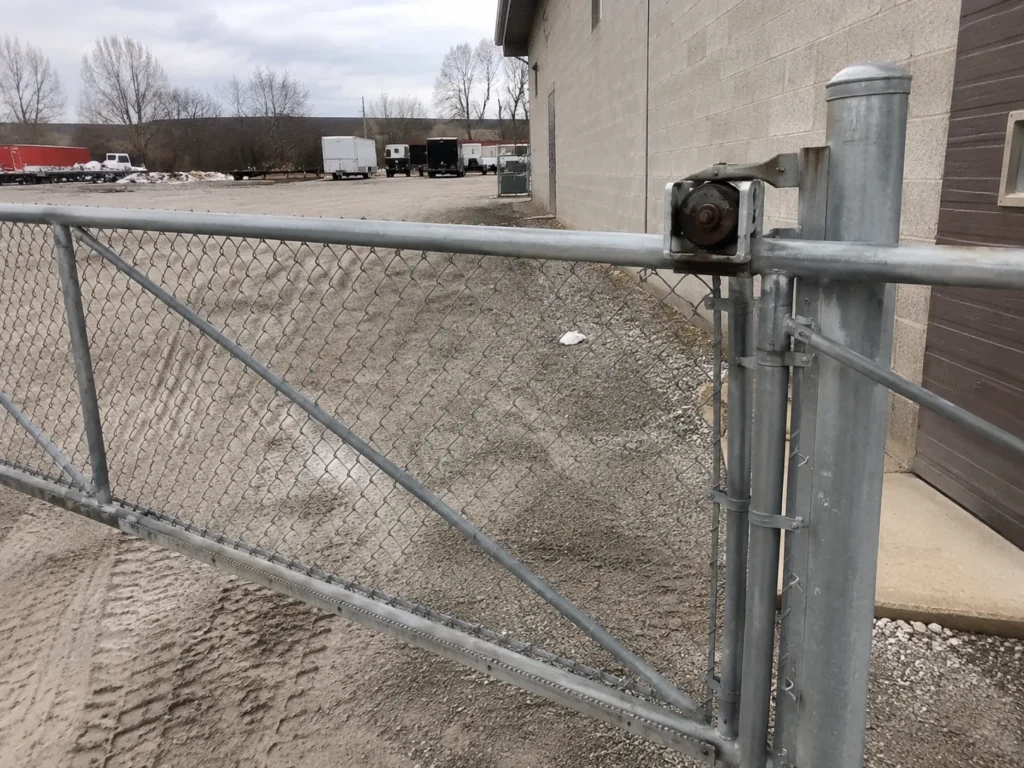 Detailed view of galvanized chain link driveway gate in Robins, Iowa