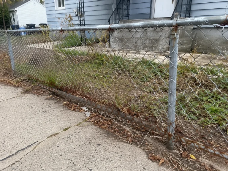Cedar Rapids, Iowa view of older galvanized chain link fence