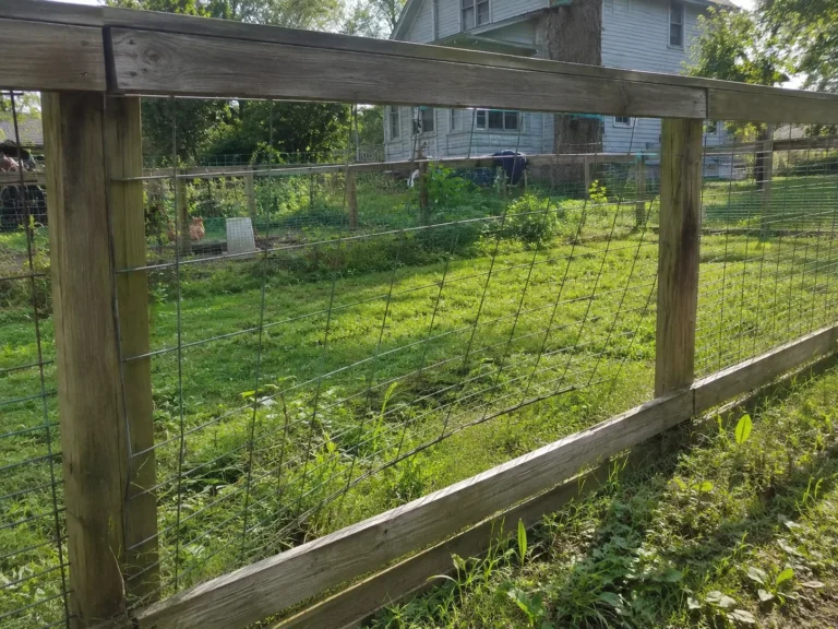 Cedar Rapids, Iowa fence project showing rustic post and wire fence section