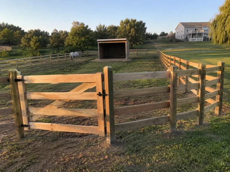 Residential split rail ranch fence and gate photographed in Hiawatha, Iowa
